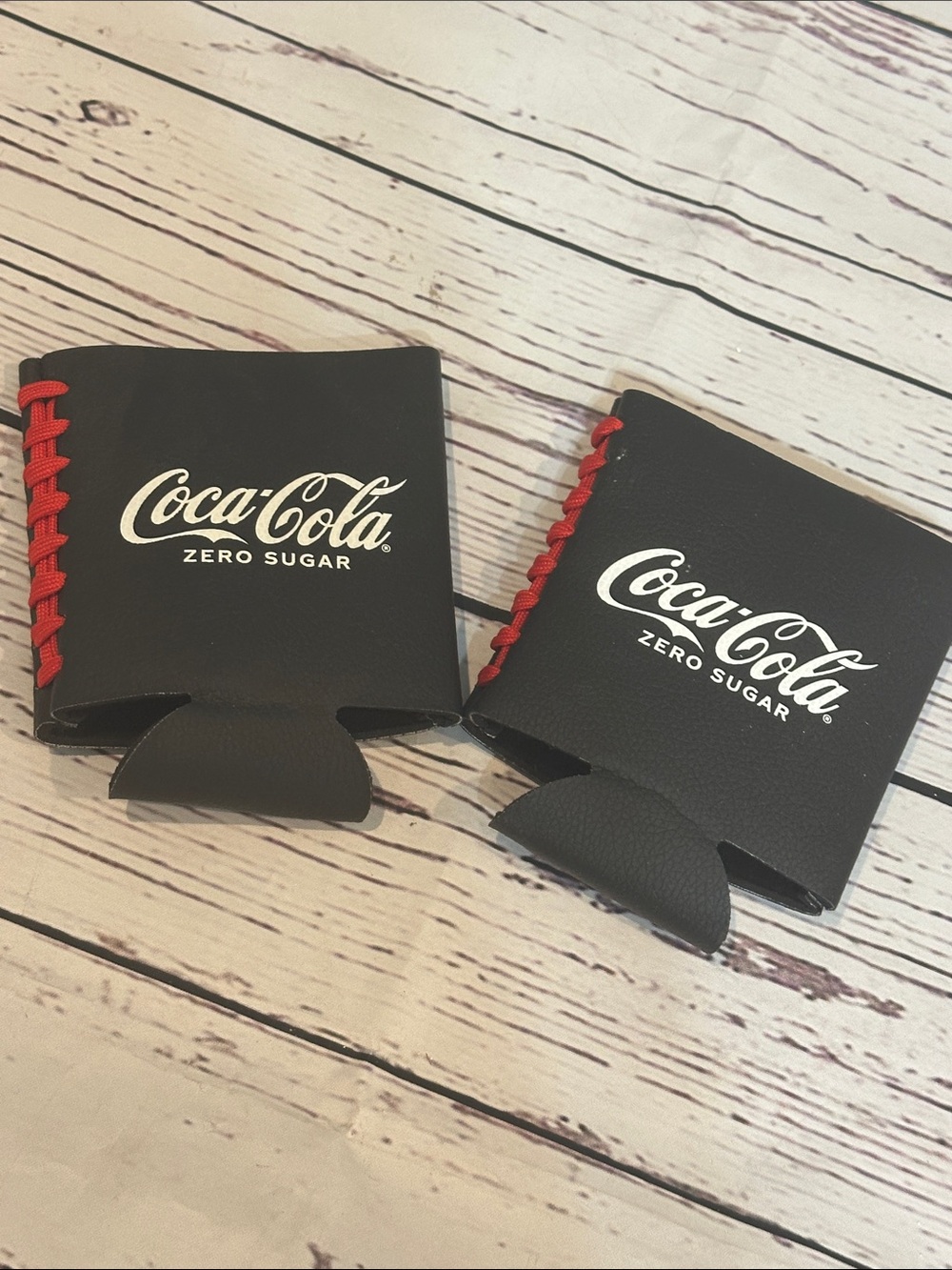 Coca Cola Black Can Cooler with Red Football Lace-up Detail